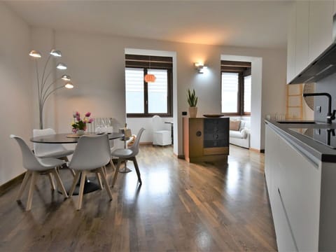 Property, Furniture, Cabinetry, Building, Table, Plant, Countertop, Wood, Gas Stove, Lighting