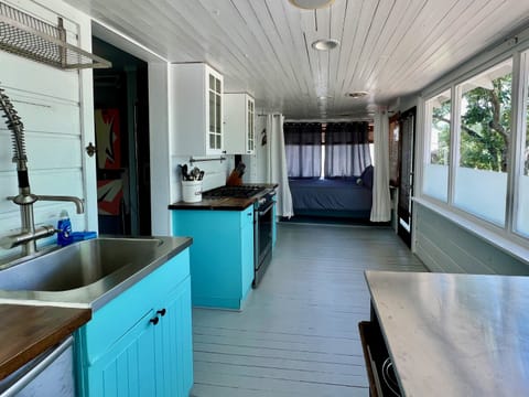 Kitchen, Daybed at the far end.