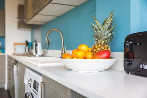Kitchen with plenty of food prep work surfaces