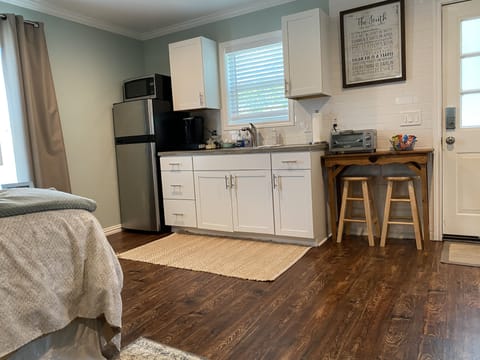 The kitchenette is stocked with basic essentials and treats.