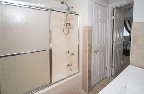 Combined shower/tub, hair dryer, towels, toilet paper