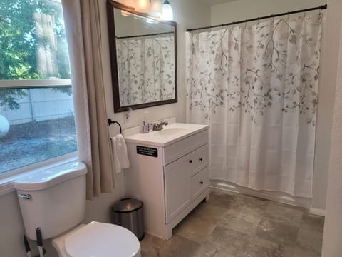 Combined shower/tub, hair dryer, towels, soap