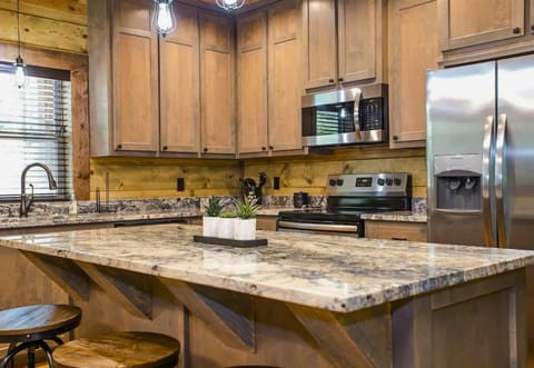 A chef's dream—enjoy preparing meals in this spacious kitchen with top-notch appliances.