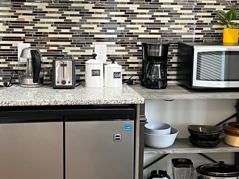 Fridge, microwave, stovetop, coffee/tea maker