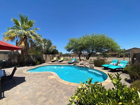 Oasis in the Desert! Spacious patio with a private, heated pool. 