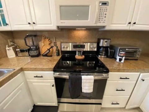Kitchen fully equipped w appliances, crock pot, utensils, etc.