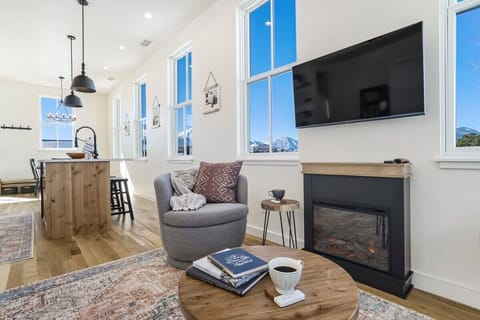 Welcome to Alpine Estate! Enjoy TV while you are warming up and getting cozy by the Fireplace.