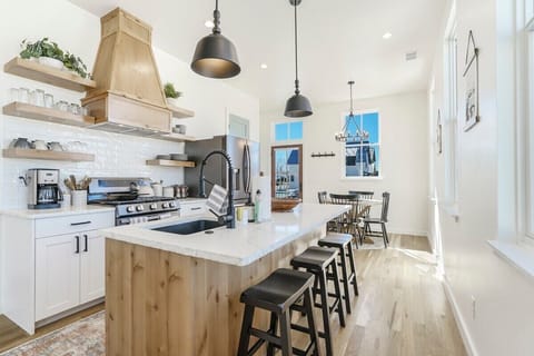 Not the cook but love being nearby... Rest assured the open layouts on each floor are perfectly inviting!