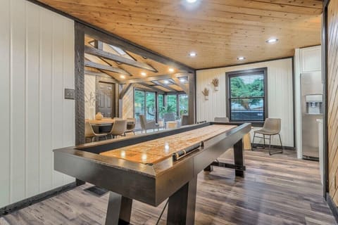 Grab a drink and take part in a friendly game of Shuffle Board as you pass the time!