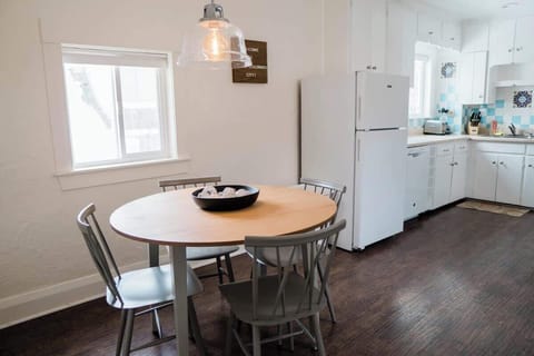 Your view once walking through the front door! A dining room joins the kitchen. The master bedroom is to your left and the living room, second bedroom, laundry room, and bathroom are to your right.