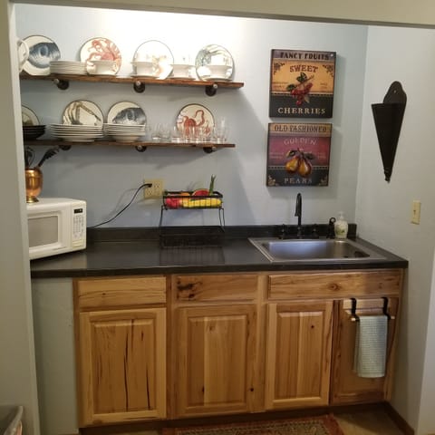 Fridge, microwave, toaster, cookware/dishes/utensils