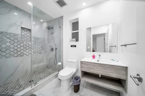 Combined shower/tub, hair dryer, towels, soap