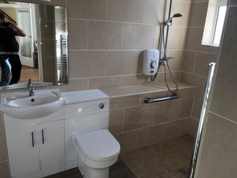 Combined shower/tub, hair dryer, towels, soap