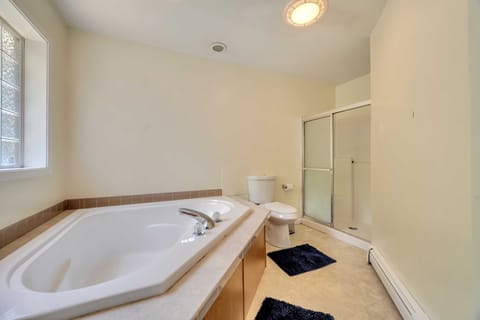 Combined shower/tub, hair dryer, towels, soap