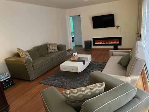Living area also boasts fireplace, central a/c and heating.