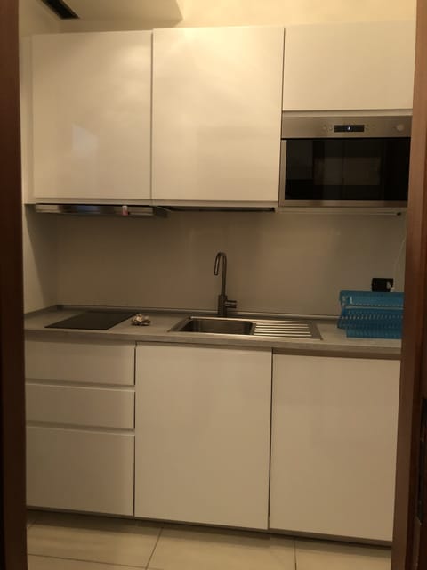 Fridge, microwave, cookware/dishes/utensils