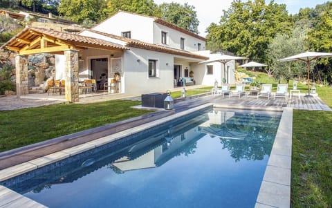 A heated pool, sun loungers