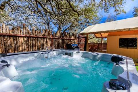 Tent yard with hot tub