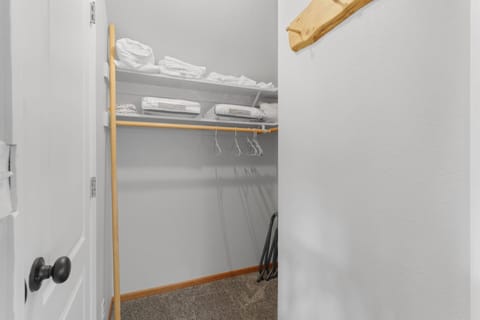 Walk Through Closet at top of spiral Staircase