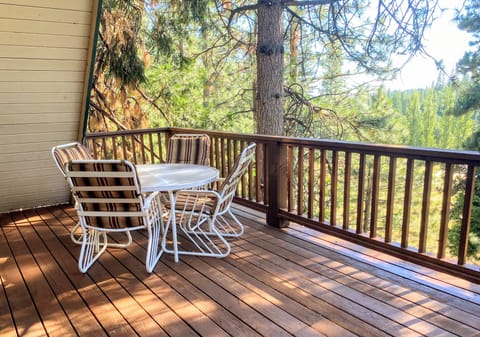 Deck with outdoor furniture and a bbq grill