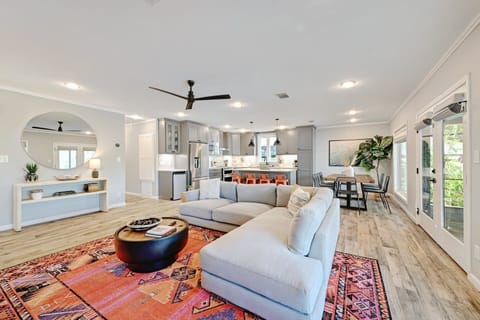 The living area offers plush seating and an open floor layout