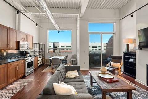 Spacious and professionally-decorated, open-concept living/dining/kitchen