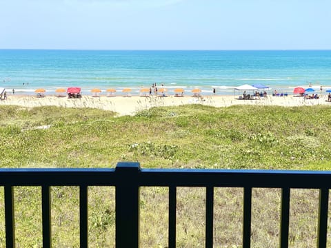 On the beach, sun loungers, beach towels