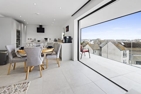 The open plan living space is the perfect place to cook, dine and relax