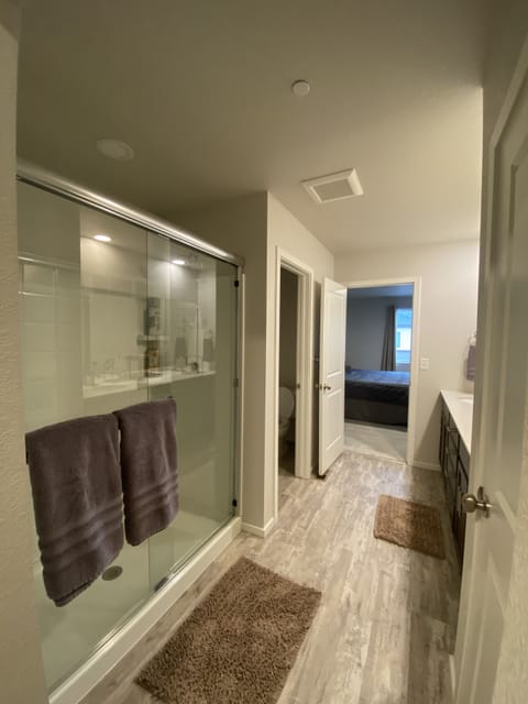 Combined shower/tub, hair dryer, towels, soap