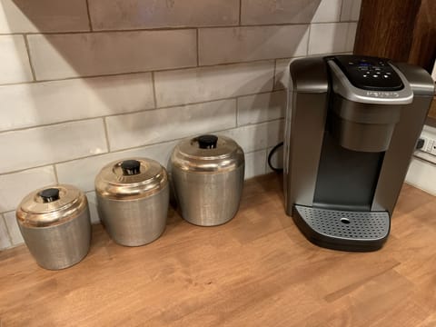 Keurig and pods, creamer, sugar and sugar substitute. Full-sized coffee pot too!