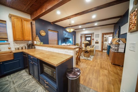 Make dinner while youngsters carefully play with the vintage dollhouse nearby.