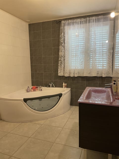 Jetted tub, hair dryer, towels, soap