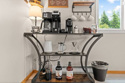 Deluxe coffee bar equipped with drip, K-cup/single-serve, Nespresso, French Press, Pour over.  Coffee grinder, sugar and flavored syrups available