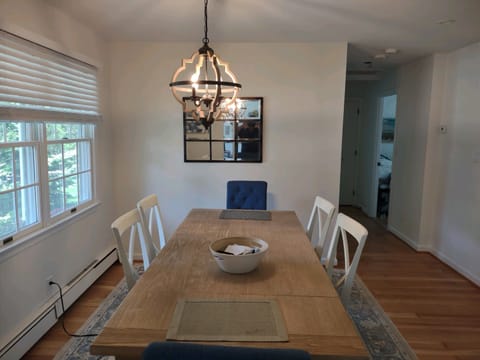 Dining area flows into open living room and kitchen