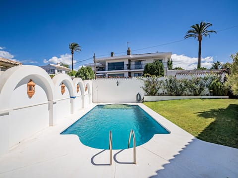 Water, Sky, Property, Building, Azure, Tree, Shade, Swimming Pool, Architecture, Arecales