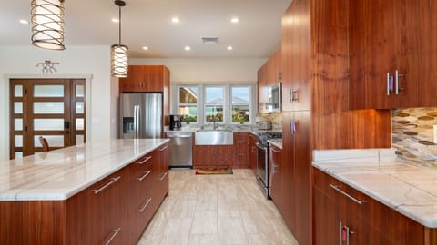 Gourmet kitchen stocked with cookware, spice and oils and a great assortment of cooking essentials