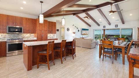 Gourmet kitchen with room for three at the island