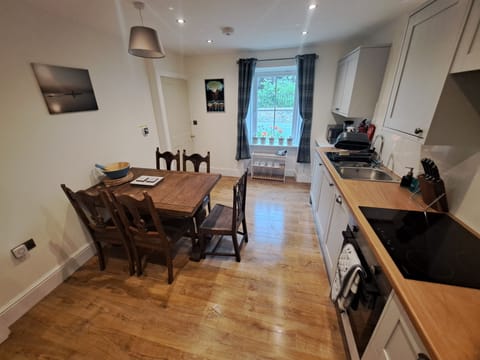 Full kitchen and dining area.