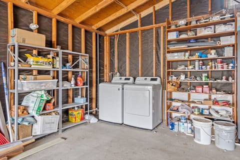 The shared laundry is located in the garage.