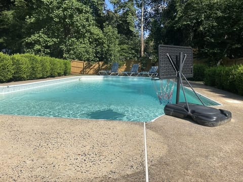 Pool with basketball hoop