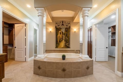 Bathtub, jetted tub, hair dryer, towels