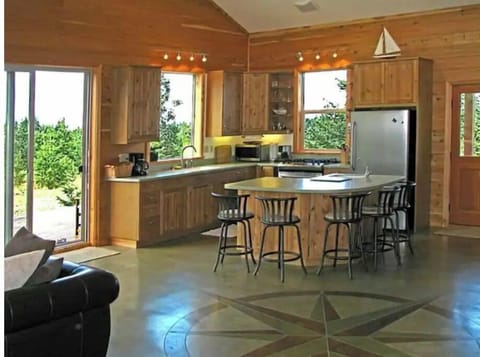 Large, open air kitchen has everything you need to make a great meal