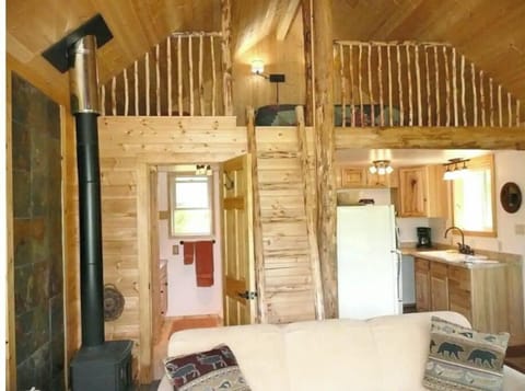 The upstairs loft as seen from the main living area has a queen bed. 