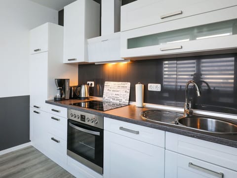 Cabinetry, Countertop, Property, Furniture, Sink, Kitchen Sink, Kitchen Stove, Kitchen, Kitchen Appliance, Wood