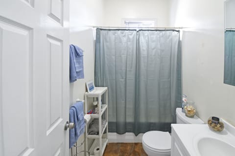 Combined shower/tub, shampoo