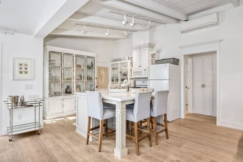 Kitchen with island in center. Lots of room and seating.