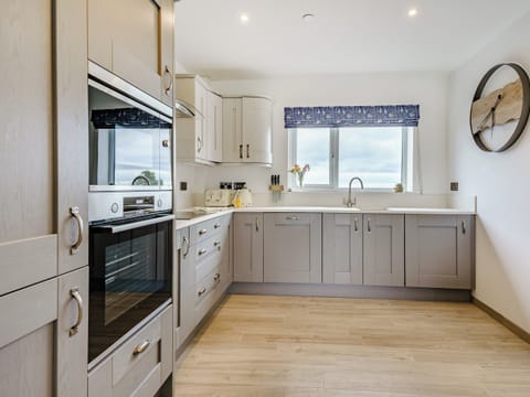 Kitchen area | Willow Tree Cottage - Coastal View Cottages, Ludchurch, near Narberth