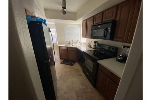 Fridge, microwave, cookware/dishes/utensils