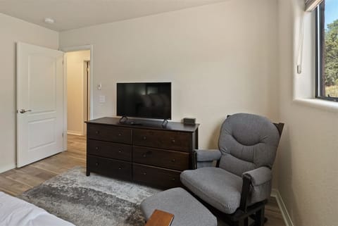 There`s an occasional chair and TV