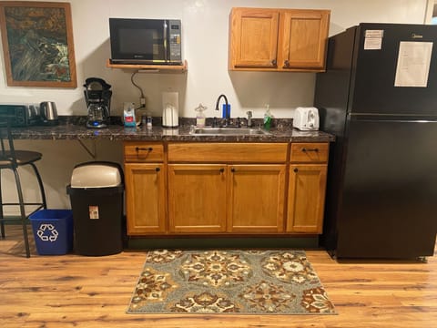 Full-size fridge, microwave, coffee/tea maker, electric kettle